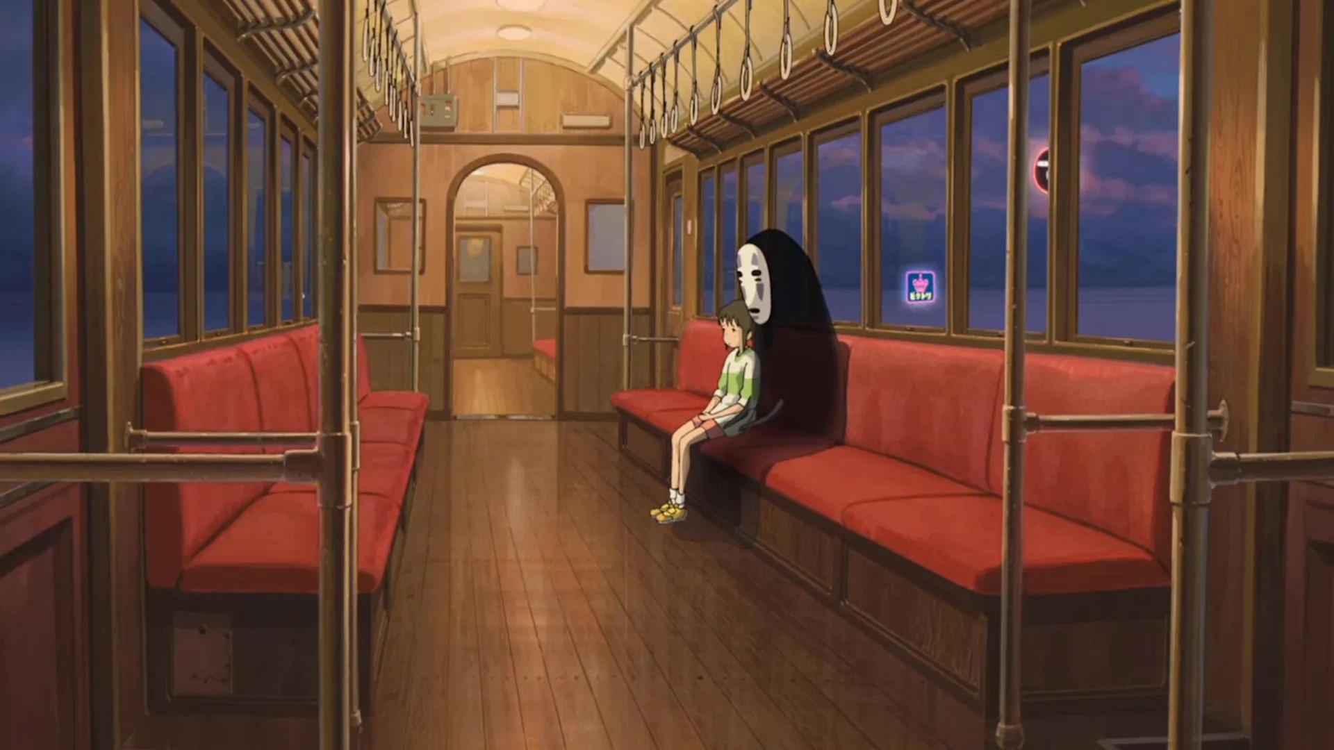 Chihiro e Sem Face no trem em A Viagem de Chihiro.